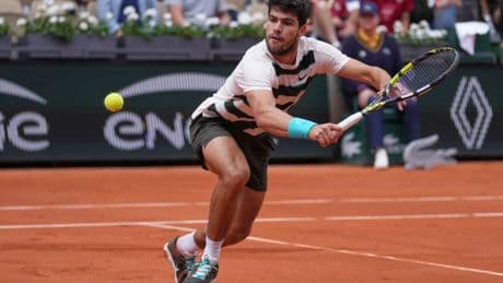 Carlos Alcaraz eases to straight-sets victory in French Open defence