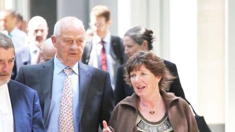 Couple suing neighbours over 'picnic-ruining fence' told to rip up own patio