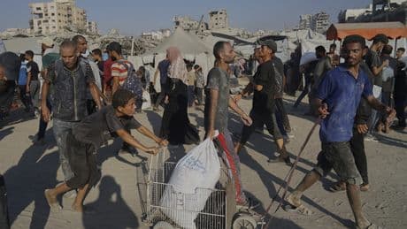 Israel begins a limited pause in fighting in 3 Gaza areas as concerns over hunger mount