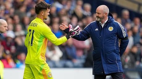 JEEPERS KEEPERS: Clarke is in a pickle after Slicker's debut disaster... but maybe throwing the young goalie back in for Liechtenstein game could still be the best way forward?