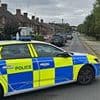 Man, 38, is charged with attempted murder after 'explosive substance found under car in street' forces dozens of families to evacuate their homes
