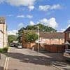 Death of woman, 60, who was found with stab wounds at home 'is linked to' 20-year-old man hit and killed by train