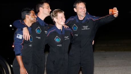 Astronauts from India, Poland and Hungary blast off on a privately funded trip to the space station