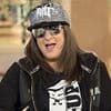 X Factor star Honey G showcases her incredible weight loss transformation in a vest and skimpy shorts as she dances wildly in fun social media clip