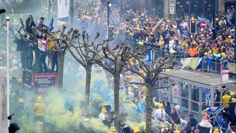 Football fan fighting for his life after horror fall from tree during promotion parade