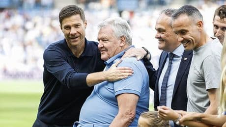Liverpool and Wales legend makes rare public appearance after health battle as Xabi Alonso hugs mentor who helped shape his career