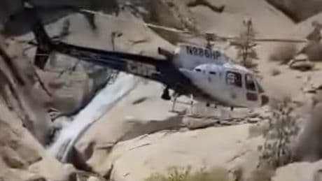 Dramatic video shows hiker airlifted to safety after two days trapped behind waterfall