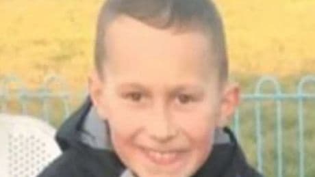 Tributes paid to 'beautiful' boy killed in horror fire as kids arrested
