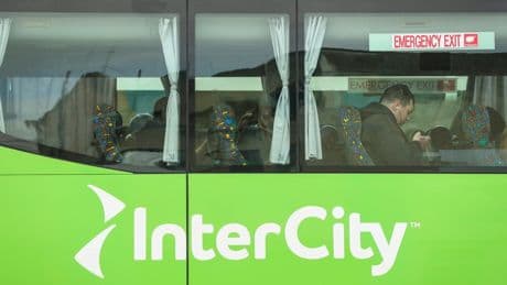 New Zealand woman arrested after 2-year-old girl found alive in suitcase stowed in bus luggage
