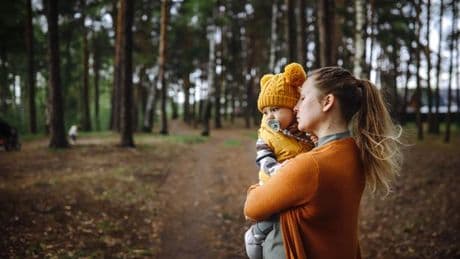 Mum takes selfie with child in woods and later spots three in photo