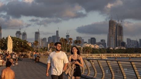 Iranians and Israelis Begin Tense Return to Normal Life
