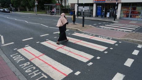 Man arrested after woman racially abused while England flags were painted on homes in Essex