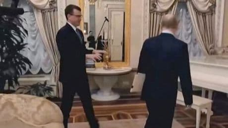 Putin shows off luxury apartment complete with gold-plated doors and grand piano