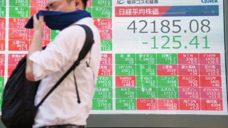 Asian benchmarks slip after US stocks sink and Japan faces political uncertainty