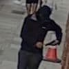 Murder suspect filmed with gun in street chase