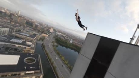 Daredevil scales Copenhagen’s tallest hotel before leaping from top