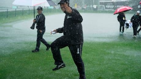 Golf star braves downpour and wild thunderstorms in astonishing PGA Championship practice round
