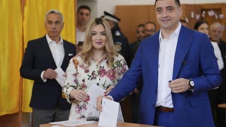 Romanians vote in a tense presidential runoff that pits nationalist against pro-EU centrist