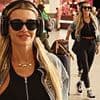 Christine McGuinness keeps it casual and smiles as she touches down in the UK after quitting the new series of Celebs Go Dating