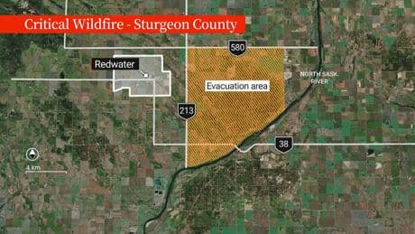 Crews battling wildfire north of Edmonton not out of the woods yet, say officials