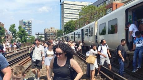 Just Eat driver tosses water to evacuated London train passengers ‘slowly cooking’ in heatwave