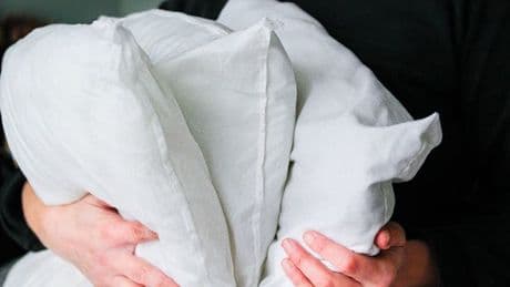 Get pillows gleaming white again by adding 1 natural item to the wash