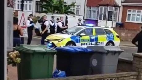 Famous ice cream seller stabbed to death in front of his van as two people arrested