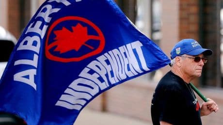 Danielle Smith squares off with tense crowd at heated Alberta Next panel in Edmonton