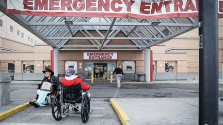 Alberta ER doctor challenges Premier Danielle Smith to come on shift, see patients wait in hallways