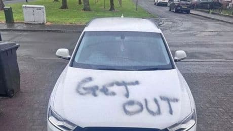 Sectarian attack forces heavily pregnant woman from home as 'GET OUT' sprayed on car