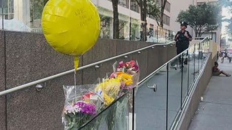 Hundreds honor security guard killed in New York office tower shooting