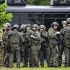 Frantic hunt for gunman after Democratic lawmakers shot at their homes in 'targeted attacks'