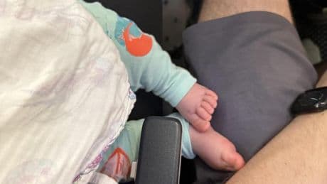 Passenger moans parent lets baby’s feet dangle on lap while feeding tot on flight – but who is in the right?