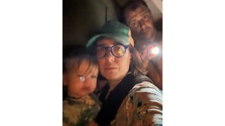 A Texas family clung to life on their roof, capturing the terrifying flooding in photos and video