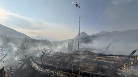 Fire crews working to contain a wildfire just west of Banff townsite