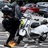 Moment gang of brazen thieves use angle grinder to steal scooter outside IKEA in south London as security helplessly watch on