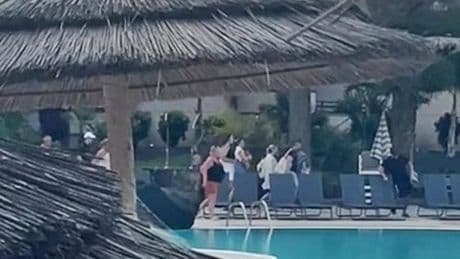 Desperate Brit tourists sprint to secure poolside spots even after queuing for hour
