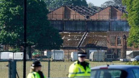 Two firefighters and a member of public die as 'explosions heard' at ex-RAF base