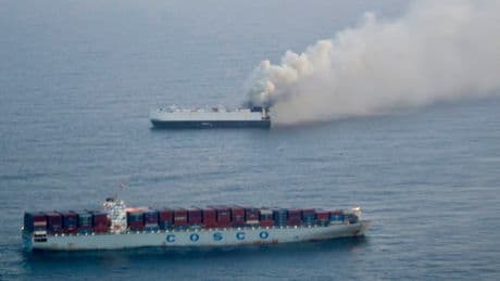 Cargo ship carrying new vehicles sinks in international waters