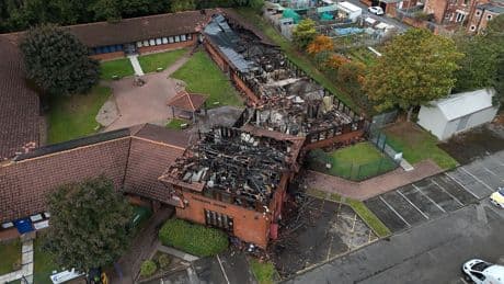 Man charged with arson after major fire at MP's constituency office