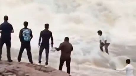 Horror moment YouTuber swept away by waterfall after posing for drone video