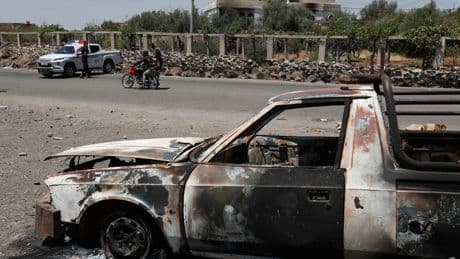 Fresh clashes break out in Syria as the interim government struggles to ease tensions