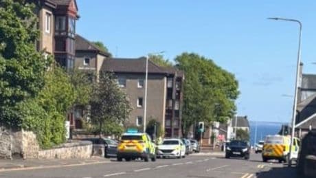Police cordon off Kirkcaldy street after woman found seriously injured