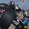 Shocking moment NASCAR mechanic is struck by a flying tire during pit stop