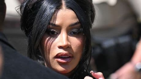 Cardi B lobs pen at 'disrespectful' reporter minutes after being cleared of assault