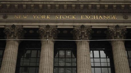 Wall Street drifts after the Fed indicates it may still cut rates twice this year