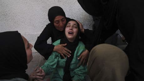Israeli strikes kill 52 in Gaza including 36 in a school-turned-shelter, medics say
