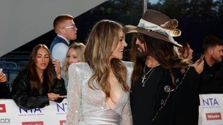 Liz Hurley snogs Billy Ray Cyrus as pair join her son at National Television Awards