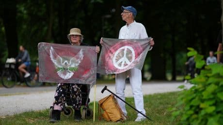 Photos show people protesting a NATO summit in The Hague