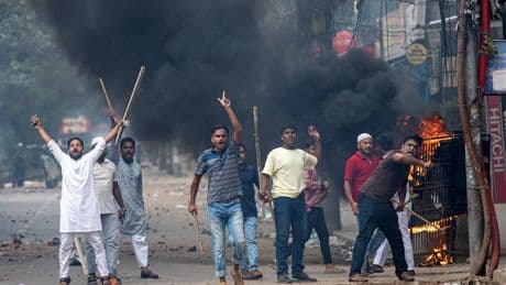 Bangladesh struggles to contain the fallout of an uprising that toppled its leader last year